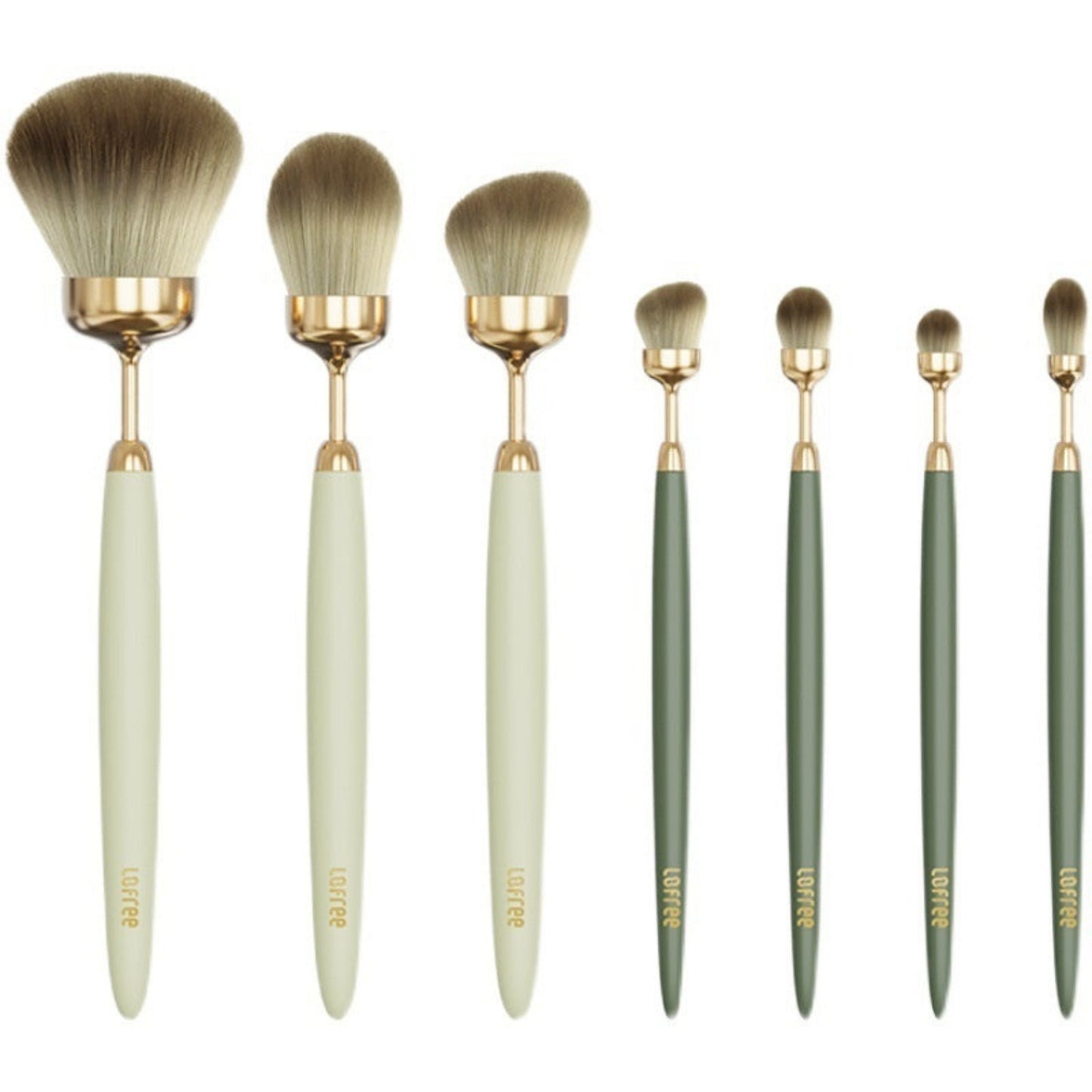 Set of makeup brushes with gold accents on a white background